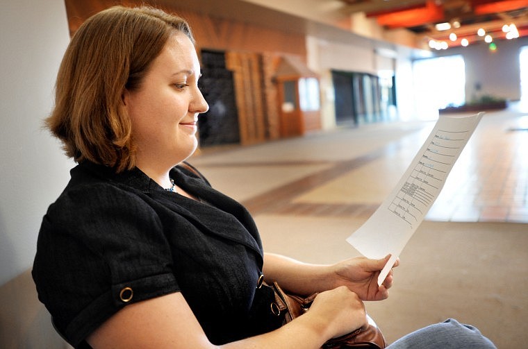 Anna Helander of Whitefish waits for her job interview on Tuesday at the TeleTech job fair. The Kalispell call center is adding 100 jobs by March. Helander, who works at the deli at Super 1 Foods in Whitefish, said she decided to apply for a customer support job at TeleTech because her hours have been slashed at the deli.