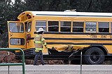 Boy dies in school bus crash
