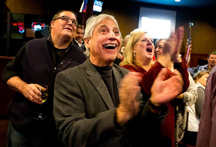 &lt;p&gt;Rick Souza, center, cheers with fellow Republicans at Fedora as Donald Trump's victory of Florida is announced on Election Night on Tuesday, Nov. 8, 2016.&lt;/p&gt;