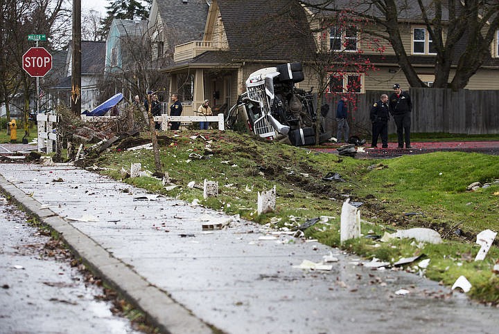 &lt;p&gt;LOREN BENOIT/Press A truck rests on its side at Miller Avenue on Nov. 25, 2016 in downtown Coeur d'Alene. The male driver lost control of his vehicle as he headed north on Second Street and took out a plastic fence and nearly collided with several parked cars. The driver was transported to Kootenai Health with minor injuries and the cause of the crash is under investigation.&lt;/p&gt;