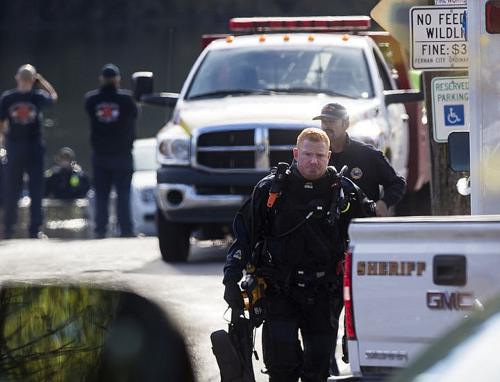 &lt;p&gt;LOREN BENOIT/Press A diver walks back to his emergency vehicle after responding to a submerged passenger car fatality Thursday, Nov. 2, 2016 at the Fernan Lake boat launch.&lt;/p&gt;