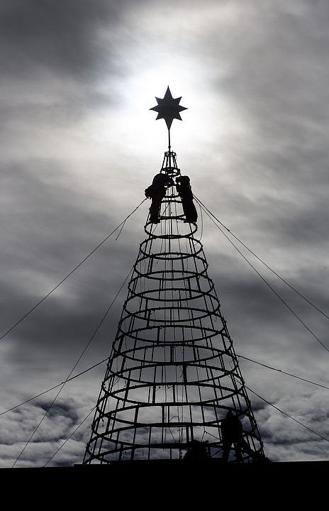 &lt;p&gt;LOREN BENOIT/Press A holiday lights crew secures the star at the top of a 60-foot fabricated tree on the roof of the Hagadone Corporate building on Wednesday, Nov. 2, 2016 in downtown Coeur d'Alene in preparation for the Resort's annual holiday lights display.&lt;/p&gt;