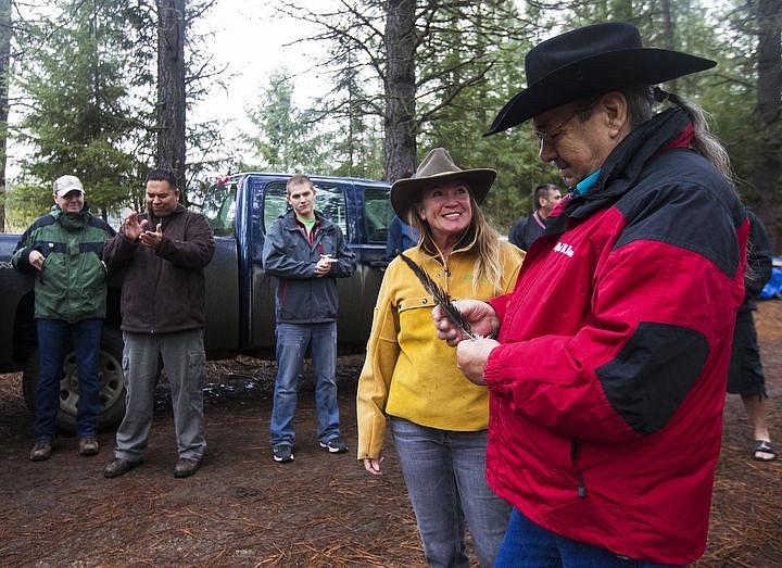 &lt;p&gt;LOREN BENOIT/Press Eagle expert and U.S. Fish and Wildlife biologist Jane Veltkamp passes a golden eagle feather that fell off an injured golden eagle to Coeur d'Alene Tribe Elder Alfred Nomee for the Tribe's keeping on Nov. 30, 2016 outside of St. Maries, Idaho. The only people to legally have eagle feathers are federally recognized tribes, which display feathers on their regalia during religious and cultural ceremonies.&lt;/p&gt;