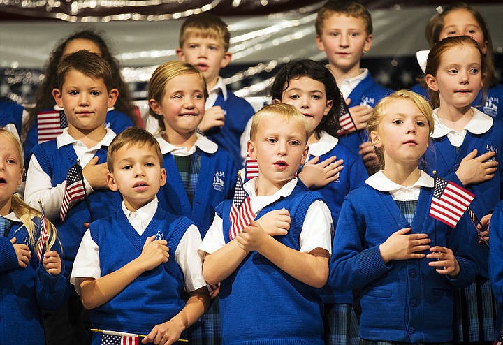 &lt;p&gt;LOREN BENOIT/Press LAM Christian Academy students put their hands over their heart as they sing &quot;God Bless America,&quot; Thursday, Nov. 10, 2016 at LAM Christian Academy's Veterans Day performance.&lt;/p&gt;