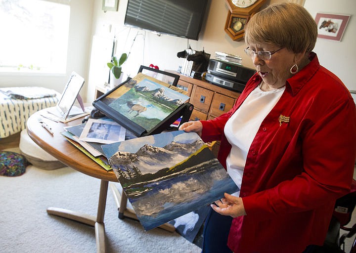 &lt;p&gt;LOREN BENOIT/Press Veldonna Armstrong holds one of her acrylic paintings Thursday, Nov. 10, 2016 at her Garden Plaza apartment. Armstrong, 77, started painting three months ago with the hope of reaching out to people through her art to brighten their day. Mountain and water settings are her favorite to paint.&lt;/p&gt;