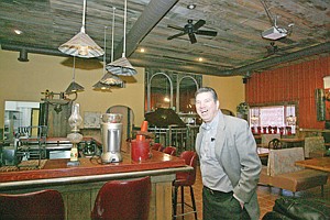 &lt;p&gt;Ray Hollingsworth smiles as he shows off the Lodge Room of Mike and Gabe's.&lt;/p&gt;