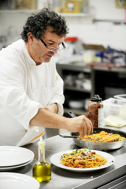 &lt;p&gt;Fabrizio Moroldo dishes up plates of his Bucatini alla Romana, made with pancetta, onions, fresh tomatoes and olives. The Bucatini noodles are from Rome. In 2013 Moroldo was recognized as one of the Best Chefs in America. He is one of only 12 across the state. (Brenda Ahearn/Daily Inter Lake)&lt;/p&gt;