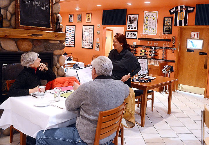 &lt;p&gt;Laura Moroldo welcomes Gary and Ginny Butterfield of Bigfork, some of the first customers of the night on Monday, December 1, in Bigfork. The restaurant is currently open four days per week for winter hours. They are open Mondays, Thursdays through Saturdays from 5:30 p.m. to 9 p.m. (Brenda Ahearn/Daily Inter Lake)&lt;/p&gt;