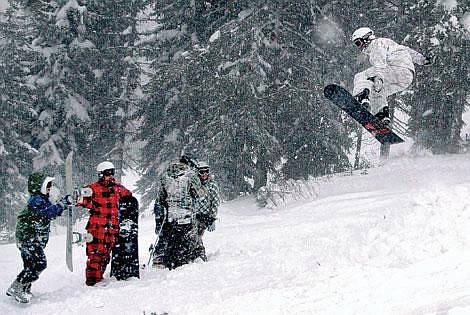 Photo by Aaric Bryan&lt;br&gt;Shauna Hendrickson goes up for a shot at the Alberton practice Tuesday.&lt;br&gt;outdoor- Coltar Ravar from Coeur d'Alene hits a jump at Lookout Pass as his friends look on Sunday. More than 3,000 people have been to the resort since it opened Thursday, Nov. 29.