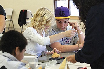 &lt;p class=&quot;p1&quot;&gt;&lt;span class=&quot;s1&quot;&gt;Tori Rushfeldt of Missoula carefully sews together a double ball.&lt;/span&gt;&lt;/p&gt;