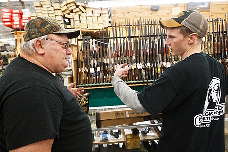 &lt;p&gt;Worley's Randy Rich, left, is assisted with gun accessory questions by Black Sheep's J.B. Wilson.&lt;/p&gt;