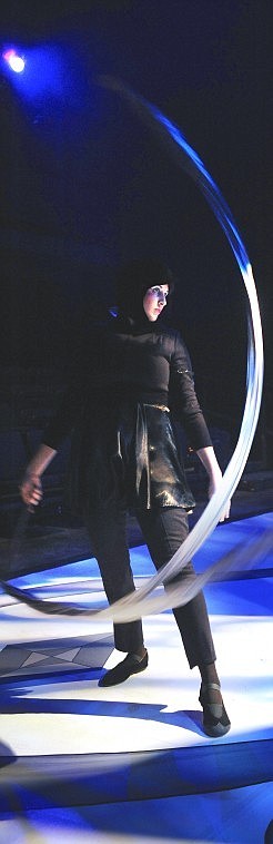 Erica Corne is one of the dancers during the tornado scene.