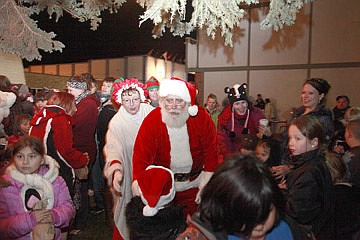 &lt;p&gt;Santa and Mrs. Klaus greet children after the lighting of the tree on Friday night.&lt;/p&gt;