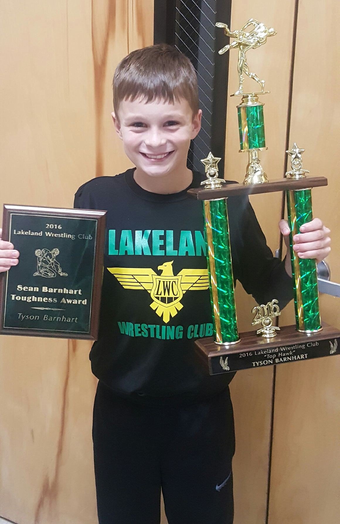 &lt;p&gt;Courtesy photo&lt;/p&gt;&lt;p&gt;Lakeland's little kids wrestling club held their end of the season banquet last Wednesday. One of the awards that they began giving out last year was the &quot;Sean Barnhart Toughness Award&quot;, after Sean passed away unexpectedly in December 2014. Sean Barnhart wrestled in the Lakeland little kids wrestling club, later coached the little kids program as well and wrestled at Lakeland High, and was also an assistant coach at the high school at one point.&lt;/p&gt;&lt;p&gt;The coach of the little kids club started the &quot;Sean Barnhart Toughness Award&quot; last year. At that time Sean's son, age 9, said &quot;next year I am going to win that award.&quot; That was his goal this season, to win the award that was named after his dad. Tyson, now 10, went undefeated all season until his last match of the season. Not only did Tyson win the &quot;Sean Barnhart Toughness Award,&quot; he also won the &quot;Top Hawk&quot; award for the Lakeland Wrestling Club.&lt;/p&gt;