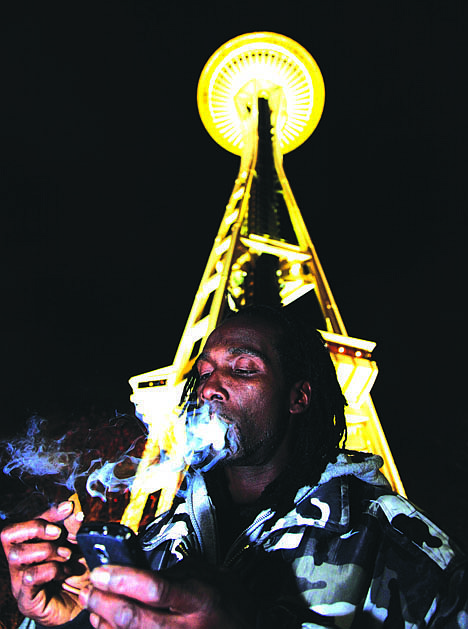 &lt;p&gt;Allister Adams smokes marijuana, Thursday, Dec. 6, 2012, just after midnight at the Space Needle in Seattle. Possession of marijuana became legal in Washington state at midnight, and several hundred people gathered at the Space Needle to smoke and celebrate the occasion, even though the new law does prohibit public use of marijuana.&lt;/p&gt;