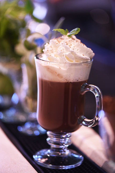 <p><strong>THE POWDER DAY</strong> is a seasonal drink served through the holidays at Spotted Bear Distillery in downtown Whitefish. It begins with peppermint tea, cocoa powder, their Vodka and sugar, and is topped with whipped cream, a mint leaf and grated organic milk chocolate. (Brenda Ahearn/This Week in the Flathead)</p>