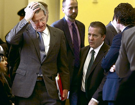 &lt;p&gt;Senate Finance Committee Chairman Sen. Max Baucus, D-Mont., left, holds his head as he walks on Capitol Hill in Washington Tuesday as negotiations continue on a bill to extended unemployment benefits and preserve tax cuts.&lt;/p&gt;