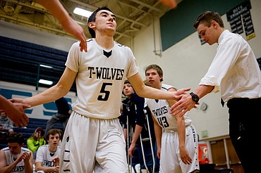 <p>Lake City's Andrew Womelduff is introduced as a member of the starting line-up before a match-up against Gonzaga Prep on Tuesday at Lake City High School.</p>