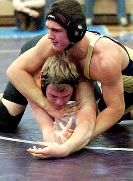 Erik Hilety puts Alex Rudolph in a lock during their match on Sunday.