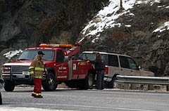 A tan Ford Explorer was pulled out of the ditch by members of Valley Towing.