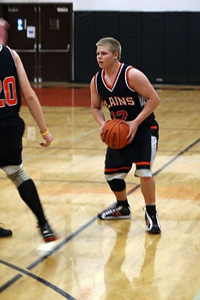 Carson Lilja holds the ball for the Horsemen during an inter-squad scrimmage on Saturday afternoon.