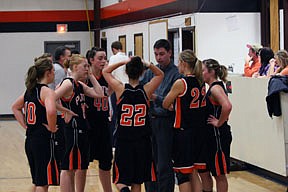 Assistant coach Matt Diehl addressed his black team during a timeout.