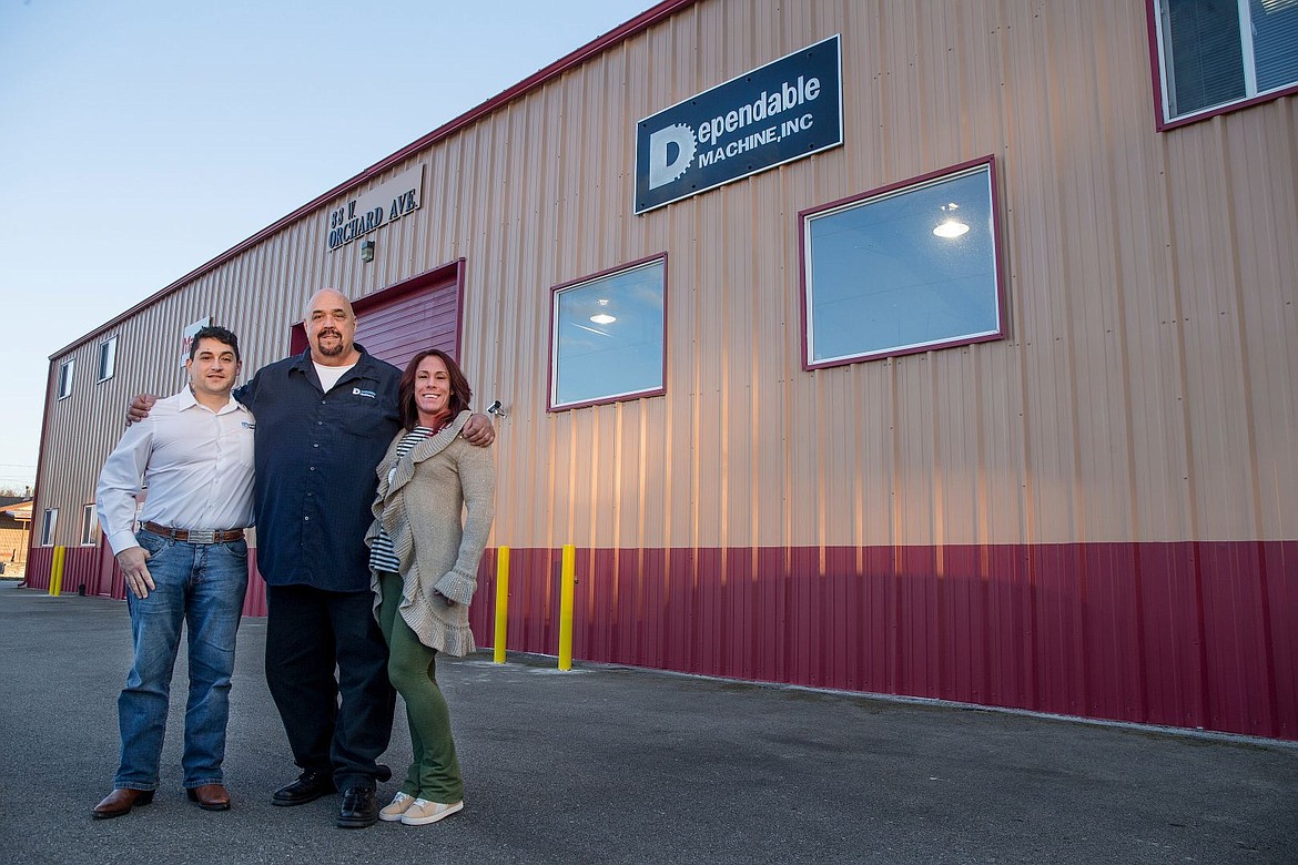 &lt;p&gt;Dependable Machine owners Dave and Mary Fisher pose for a portrait with sales manager Orville Eide on Thursday, Nov. 19, 2015, outside the company's recently-opened shop on Orchard Avenue in Hayden.&lt;/p&gt;