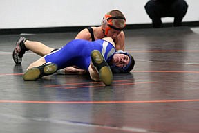 Plains Kenneth Beech pins Morley Jessop of Carvallis at the Mixer on Friday night in Plains.