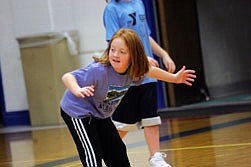Madelynn Pandis practices taking a rebounding stance at practice on Monday. The girls work a lot on the fundamentals of basketball.