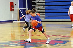 Madison Mask practices stepping over while dribbling at practice on Monday.