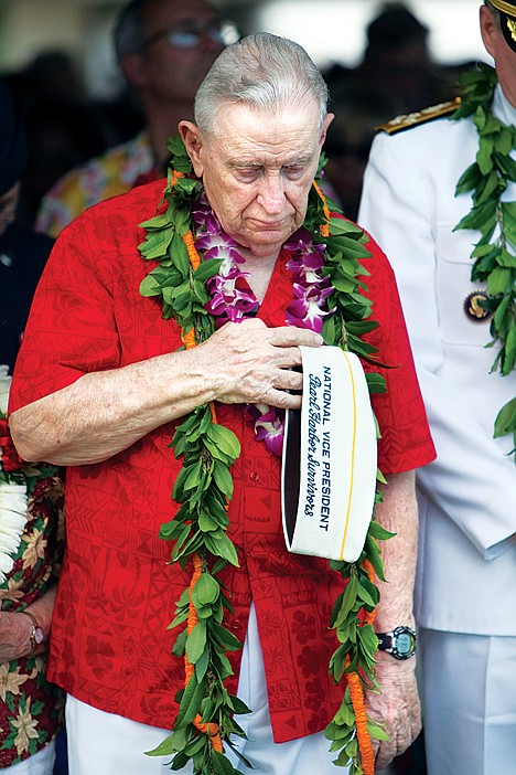 <p>Pearl Harbor survivor Mal Middlesworth prays during the Pearl Harbor memorial ceremony, Wednesday, Dec. 7, 2011, in Pearl Harbor, Hawaii. Today marks the 70th anniversary of the surprise attack on Pearl Harbor Naval Base which pulled the US into a war with Japan. (AP Photo/Marco Garcia)</p>