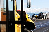 Kids OK; bus driver cited in crash