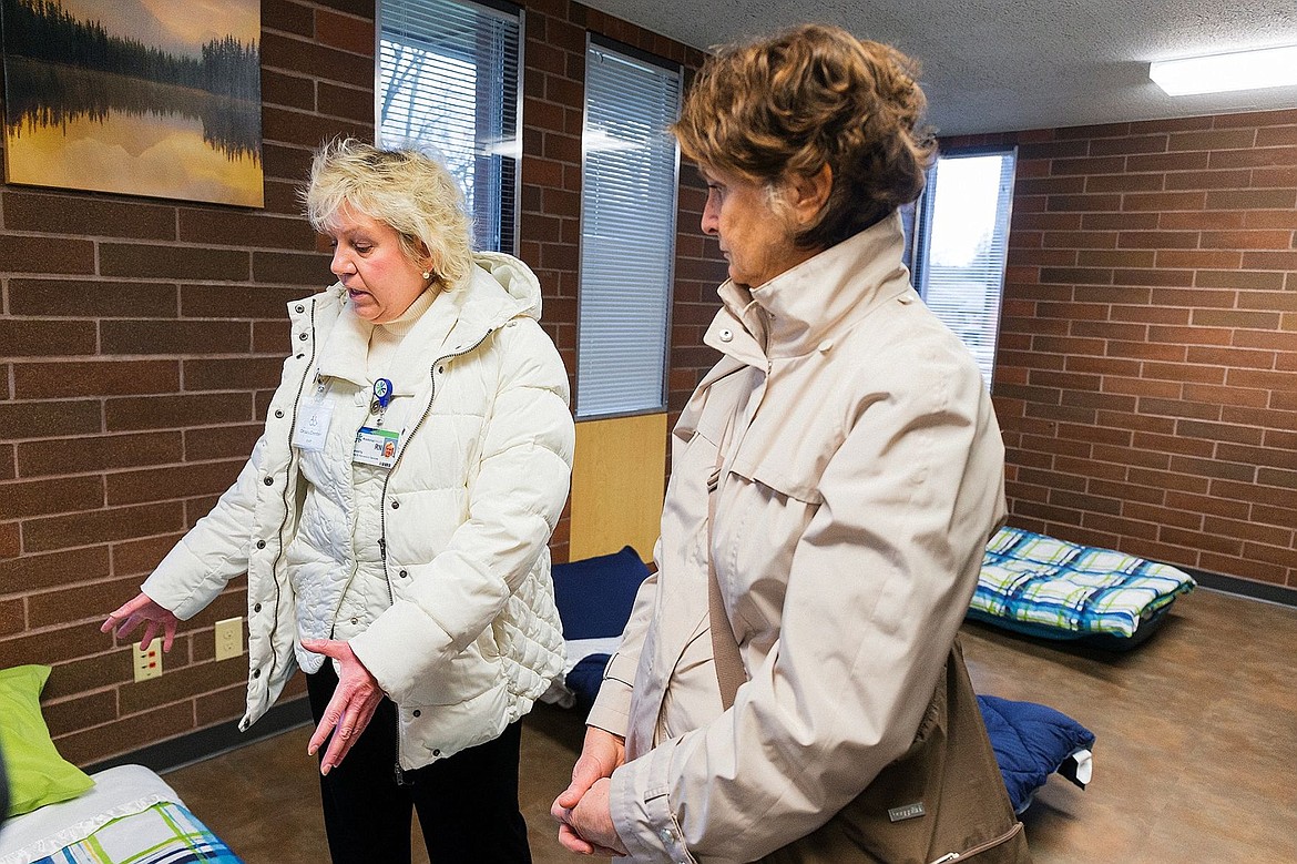&lt;p&gt;Beverly Oh, with Kootenai Health&#146;s crisis intervention services, left, describes the men's respite area of the Northern Idaho Crisis Center to Mary Rosdahl.&lt;/p&gt;
