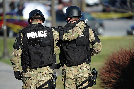 &lt;p&gt;Virginia Tech police officers console one another as they move toward the scene where a fellow police officer was killed in a parking lot on the campus of Virginia Tech, Thursday in Blacksburg, Va. A man killed a police officer and another person after a traffic stop.&lt;/p&gt;