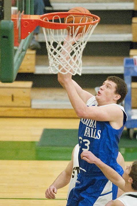 &lt;p&gt;Columbia Falls forward Austin Barth (33) lays the ball in during
second-day play in the Northwest/Southwest Tip-off Tournament
Saturday at Whitefish High School.&lt;/p&gt;