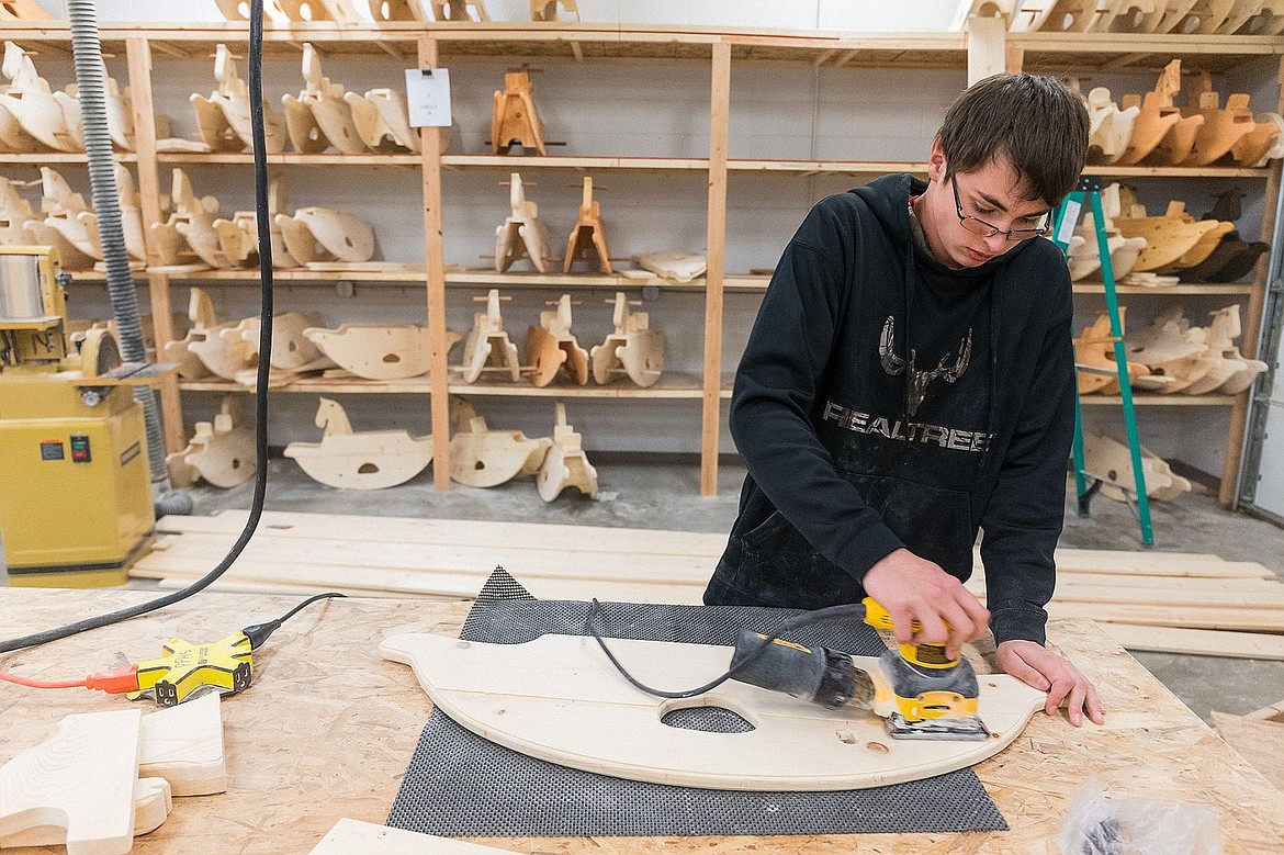 &lt;p&gt;Logan Frandsen sands a piece of wood prior to constructing parts of rocking horse.&lt;/p&gt;