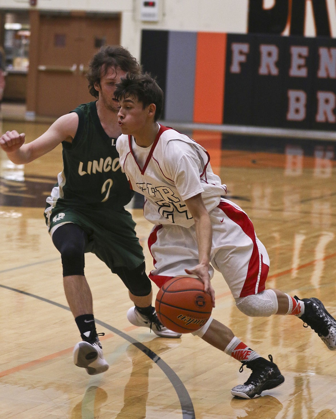 &lt;p&gt;TER's Julian Cutfinger drives around a Lincoln defender on Friday in Frenchtown.&lt;/p&gt;