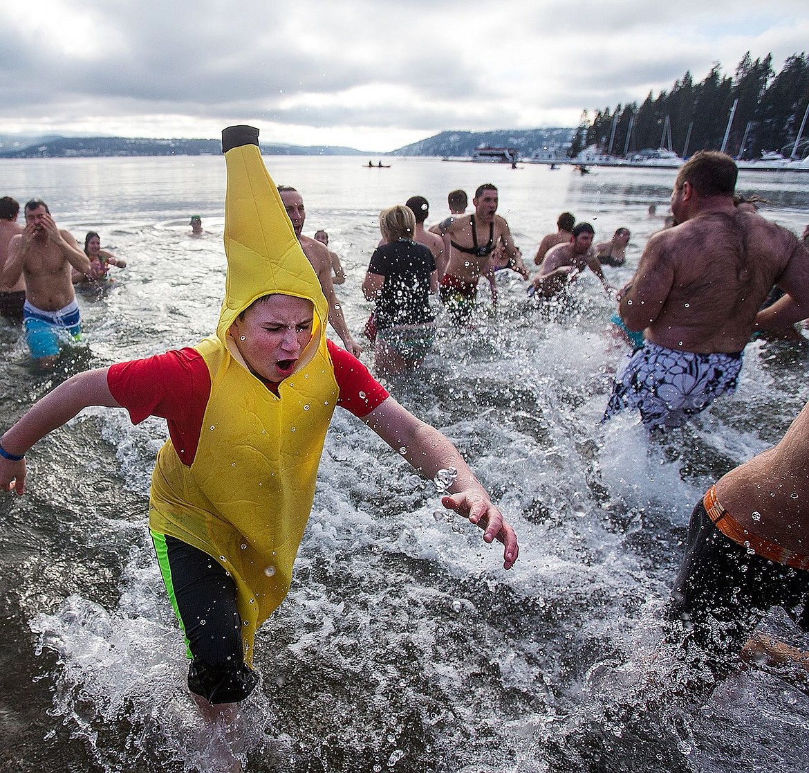 &lt;p&gt;Jake Serr, 11, exits the frigid waters of Lake Coeur d'Alene after taking part in the Polar Bear Plunge on Thursday, January 1, 2015.&lt;/p&gt;