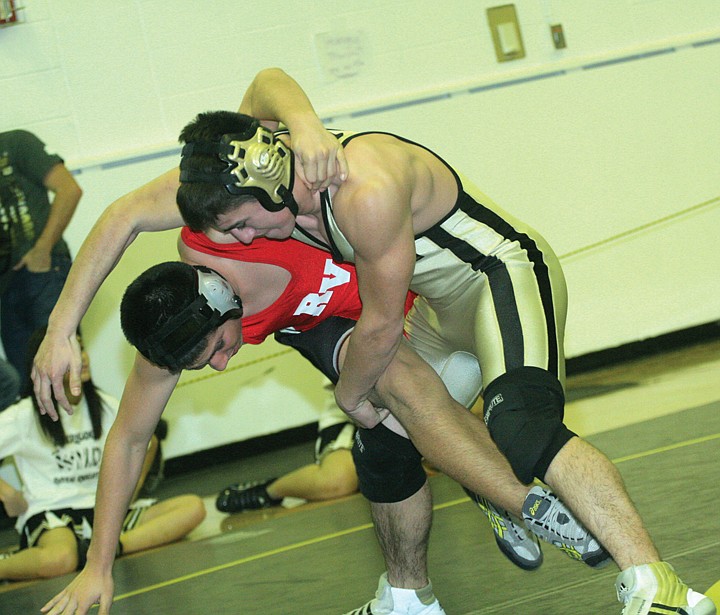 Alex Myrick, a two-time state placer, returns as a strong junior
for the Knights.