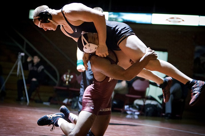 &lt;p&gt;North Idaho College's Jamelle Jones scoops Ben Price from Northwest College off the mat during the 197-pound match Friday.&lt;/p&gt;