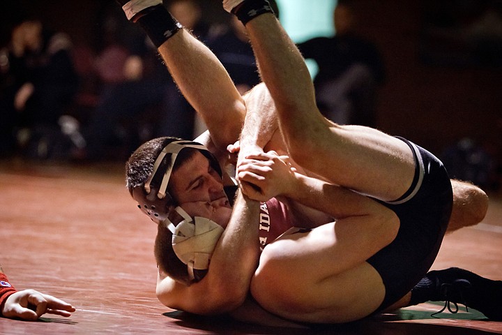 &lt;p&gt;North Idaho College's Jeremy Bommarito puts the squeeze on 157-pound Clint Jacob from Northwest College.&lt;/p&gt;
