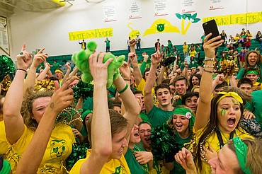 <p>Lakeland students celebrate after being awarded the pig during Fridays basketball spirit rivalry event, The Prairie Pig, in Rathdrum.</p>