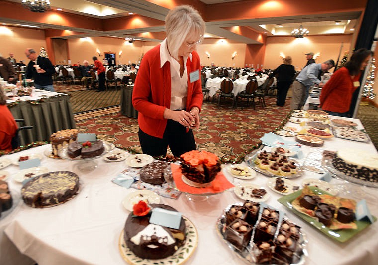 &lt;p&gt;Judges&#146; assistant Joyce Brodehl places awards on the amateur&#160;table at the 29th Annual Chocolate Extravaganza on Wednesday in Kalispell.&lt;/p&gt;