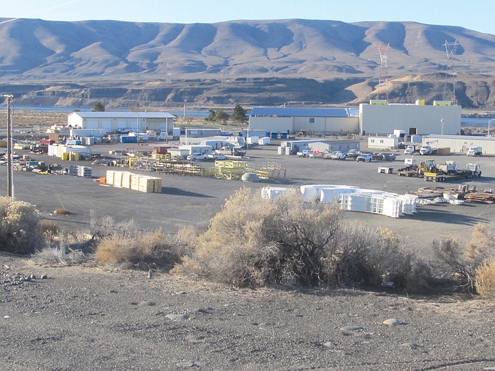 The sparkling new buildings you see at the Wanapum Dam site
while traveling along Highway 243 make up an $11 million Grant
County PUD construction project that was launched in October of
2010 and will be concluded in February of 2012. According to PUD
spokeswoman Sarah Morford, The larger building, which dominates the
scene, will have 48,500 square feet of space and will include a
warehouse, sand blasting and painting facilities and a vehicle
wash. The smaller building of 12,000 square feet will contain a
waste management facility and a vehicle and boat repair shop. The
footage numbers do not include covered car ports, mezzanines and
storage areas.