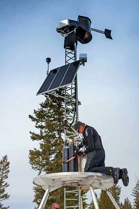 <p>In this recent but undated photo from Idaho Power, an Idaho Power employee works on a cloud seeding generator tower near Garden Valley.</p>