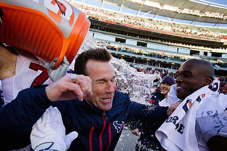 &lt;p&gt;Houston Texans head coach Gary Kubiak is dunked by his players as time expires in Sunday's game against the Bengals in Cincinnati. Houston won 20-19.&lt;/p&gt;