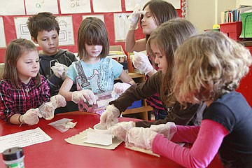 &lt;p&gt;Students from Mrs. Hout's second grade class scoop onion into chili packets for the Mission Valley Food Pantry. Left to right, Natalie Helser, Nirada Corpeo, Cassidy Orr, Trinity Carpenter, Kristy Porter-Smith and Leslie Humphrey.&lt;/p&gt;