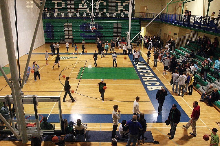 Players and fans gather and wait at the Glacier High School gym for an announcement regarding where the evenings&#146; basketball doubleheader will be played during a power outage on the north end of Kalispell. 
The girls and boys games were moved to Flathead High School.