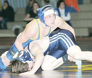 &lt;p&gt;Josh Bowers, junior, tops his Bonners Ferry opponent, Quinn Cummings. Bowers won a marathon, pinning Cummings half-way through the third period.&lt;/p&gt;