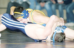 &lt;p&gt;Michael Ayala pins Bonners Ferry&#146;s Jared Coogan at 125. Ayala pinned Coogan in a minute, 20 seconds for six points. The Loggers cruised to a 61-24 victory over the Badgers.&#160;&lt;/p&gt;